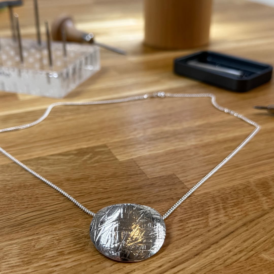 The Echo Oval Pendant